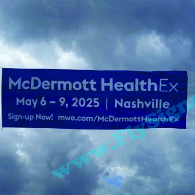 McDermott HealthEx banner over cloudy sky
